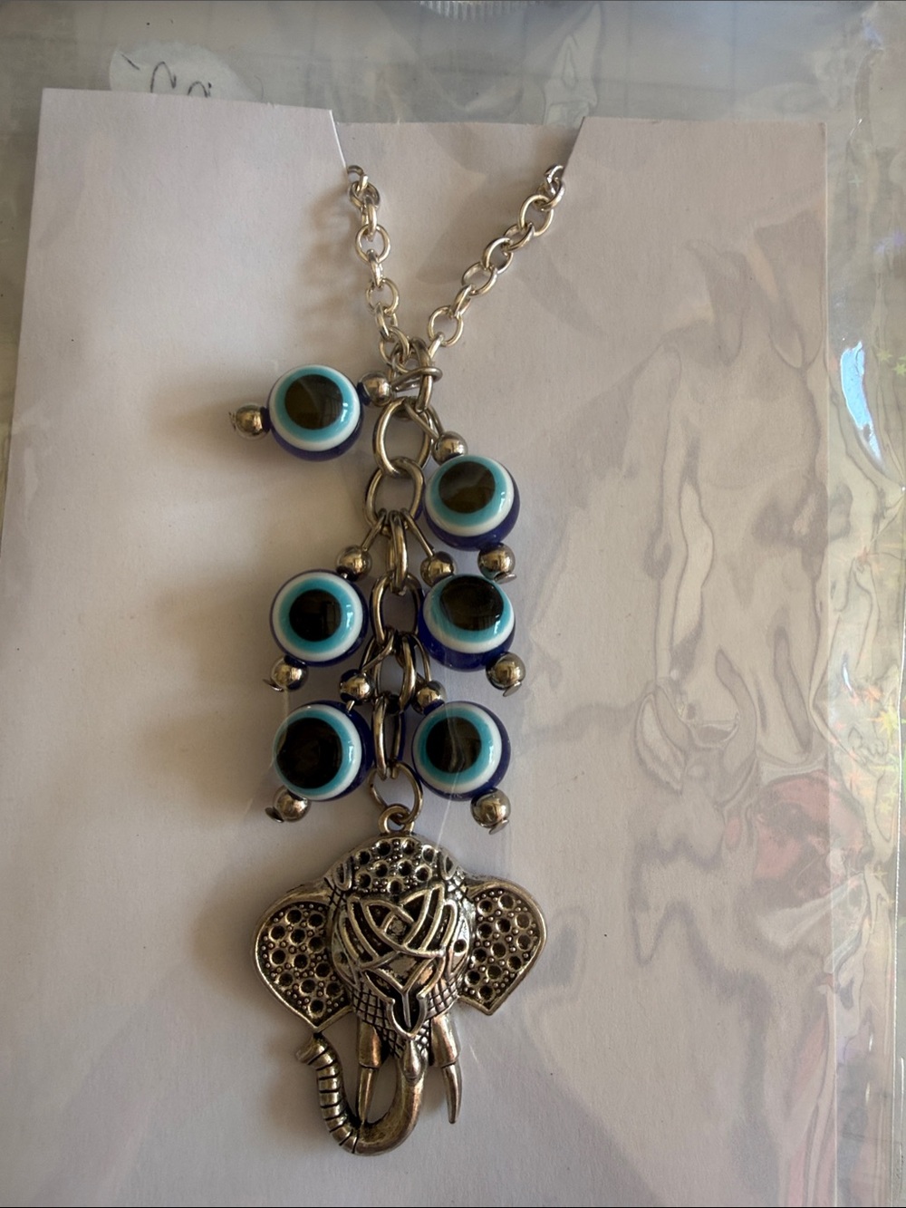 Silver Elephant Pendant Necklace with Blue Evil Eye Beads